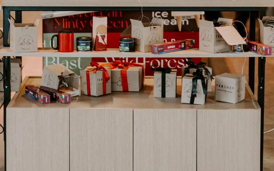 Wrapped gifts and gift items displayed on shop shelves